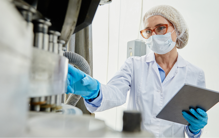A person in a laboratory testing facility.